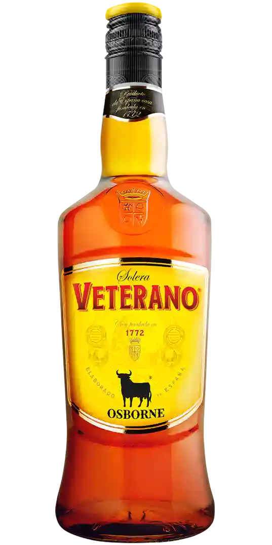 veterano Eine Flasche Veterano Osborne Brandy mit einem gelben Etikett mit schwarzem Stierlogo und roten Akzenten
